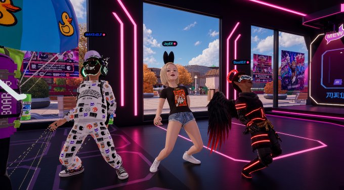 A screenshot from the metaverse platform 'Spatial' showing avatars (named SkyBEE and MattHEW) dancing in a virtual venue decorated with neon pink lights and anime-style posters.