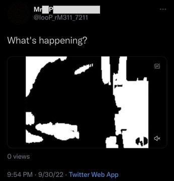 A screenshot of a tweet from @looP_rM311_7211 posted at 9:54 PM on 9/30/22 via Twitter Web App, featuring a heavily glitched black-and-white image and the caption "What's happening?" The image appears corrupted, possibly intentionally obscured, tying into the post's theme of "IT" happening—suggesting a hyped, cryptic, or data-masked announcement.