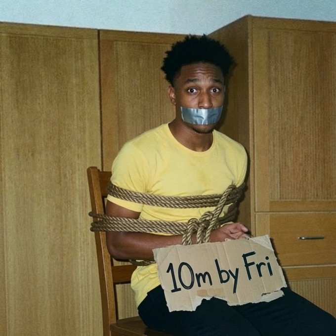 A humorous photo of a man tied to a chair with duct tape over his mouth, holding a cardboard sign that reads '10m by Fri', appearing to be a meme about deadlines.