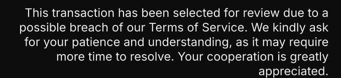 The image shows an email from someone named "Bybit" with a message about a transaction that has been selected for review due to a possible breach of their Terms of Service, which requires a more time-consuming resolution. The email also includes a request for the recipient's patience and understanding as it may require additional time to resolve.