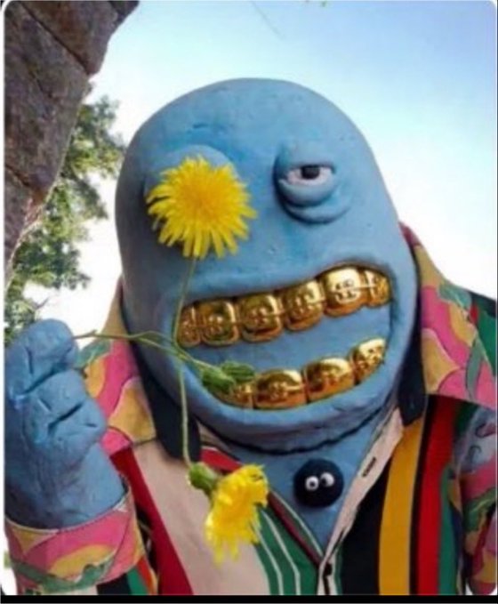 A blue-skinned, cartoonish character with gold "BAPE" teeth and a small black creature on its shirt holds a dandelion up to its face. The image captures a laid-back, "flower boy" aesthetic that matches the post's playful suggestion of being "t00ned" or vibing out, evoking a chill, carefree mood.