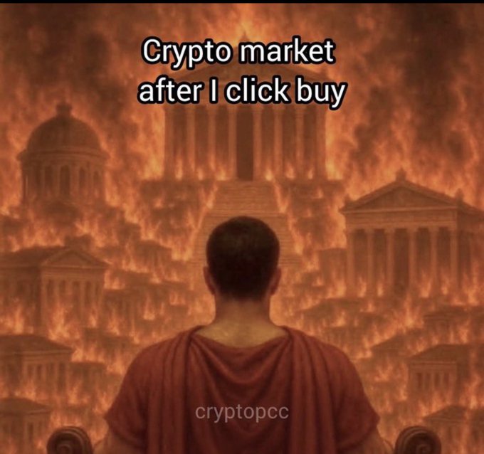 A meme showing a figure from behind wearing a toga, looking at a burning ancient cityscape, with text 'Crypto market after I click buy' and watermark 'cryptopcc'.