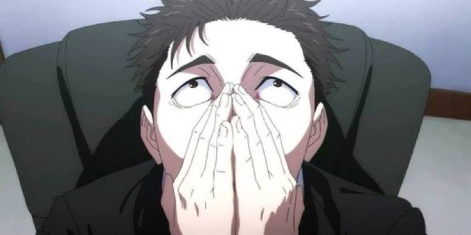 An anime-style illustration of a man in a dark suit with dark hair, sitting in a chair with his hands clasped over his mouth and nose, looking upward.