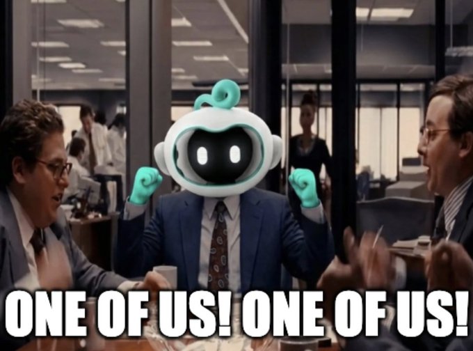 A robot character with mint-green accents and glowing eyes excitedly raises its fists while flanked by cheering businessmen in suits in an office setting, with the bold caption "ONE OF US! ONE OF US!" displayed below. The image humorously illustrates the post's point that traditional finance institutions will inevitably adopt and embrace the same innovations (like AI/crypto) they initially resist, joining the "us" of the new financial paradigm.