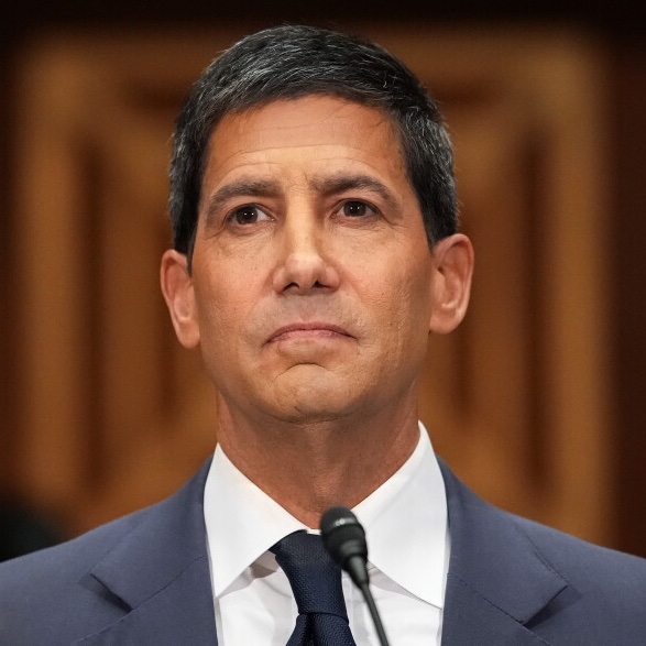The image shows Kevin Warsh, a former Federal Reserve governor and known monetary policy commentator, at what appears to be a congressional hearing. Given the post's focus on today's trade balance report and potential market volatility, the image likely relates to how Warsh's views on U.S. economic strength and Fed policy could influence trader interpretation of the data release.