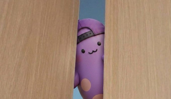 A 3D-rendered cute purple cartoon character wearing a backwards cap peeks out from between two wooden doors or panels.