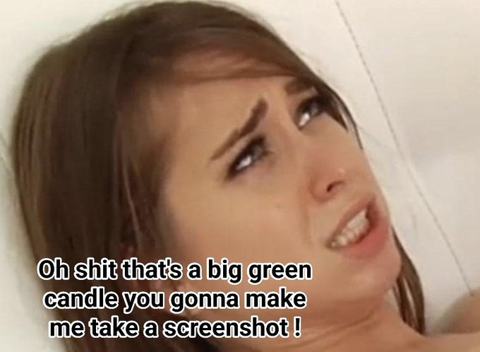 A woman with brown hair wearing a white shirt is looking up at something or someone's face while reading an offensive caption in bold font about women being big greens. The text suggests that this picture was taken, likely as part of a sale or promotion for the photo.
