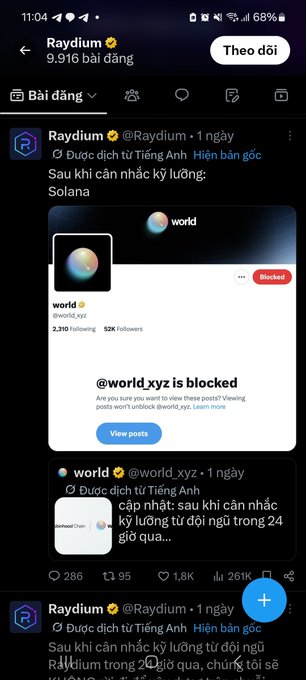 A mobile screenshot of the X (Twitter) app in Vietnamese showing the Raydium account posting about 'Solana' and sharing a screenshot of a blocked account notification for @world_xyz.