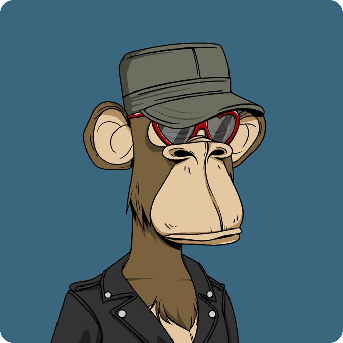 The image features a cartoon monkey wearing sunglasses, a leather jacket, and a hat. The monkey appears to be posing for a photo or drawing, possibly as part of an advertisement or promotional material. The caption below the image reads "Went from a MAYC to BAYC! Looking forward to seeing the @BoredApeYC clubhouse in Miami and @AdamWeitsman digital artists spot in Ithaca when they're done!".