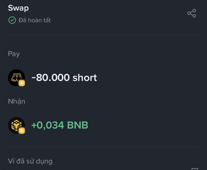 A dark-themed crypto swap interface in Vietnamese showing a completed transaction ("Đã hoàn tất") paying -80,000 short and receiving +0.034 BNB.