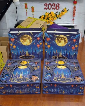 Several boxes of 'VT markets' Mid-Autumn Festival mooncakes arranged on a wooden surface, with red Chinese lanterns and the number '2026' visible in the background.
