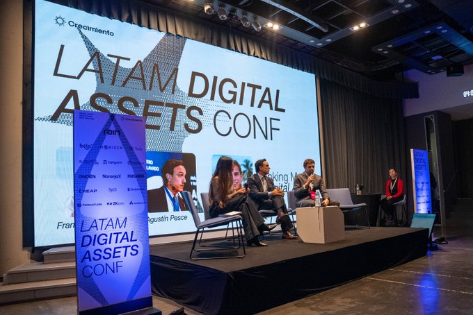 Panelists Francesca Petrazzini (Andentech), Agustín Pesce (Guardline), and Pablo Moauro (ADEBA) discuss the intersection of traditional banking and digital assets on stage at the LATAM Digital Assets Conf, sponsored by Crecimiento and partners like Binance, IOV Labs, and Marco Polo Network.