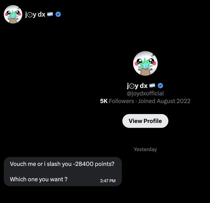The image shows a Twitter/X profile for "joy dx" (@joydxofficial) with a verified blue check, featuring a green dragon avatar and 5K followers, alongside a message that reads "Vouch me or i slash you -28400 points? Which one you want ?" sent at 2:47 PM yesterday. The post's caption "E don reach like this?" likely refers to the desperation or absurdity of the message, where someone is humorously offering a choice between vouching for them or being "slashed" with negative points, highlighting the questionable tactics being used to gain trust or reputation online.