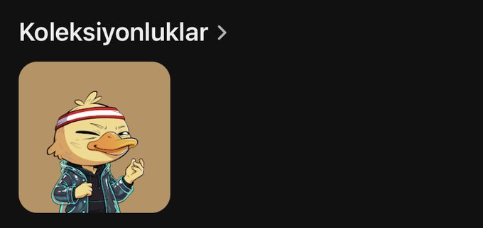 A dark mobile app screen titled 'Koleksiyonluklar' featuring a cartoon duck character wearing a red-and-white headband and a blue leather jacket, pointing upward against a tan square background.