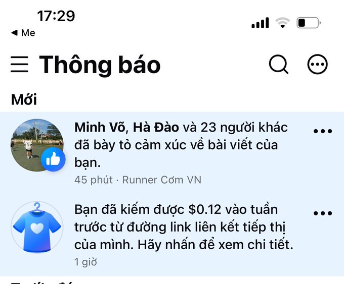 A Vietnamese Facebook notifications screen ("Thông báo") showing that 23 people including "Minh Võ, Hà Đào" reacted to the user's post, and an earnings notification of $0.12 from a referral link.