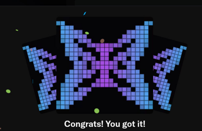 A pixel art illustration of a blue and purple butterfly made of square blocks, with the text 'Congrats! You got it!' displayed at the bottom.
