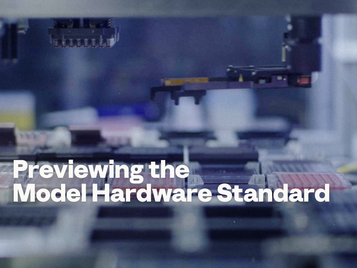 A piece of industrial machinery with mechanical arms is shown with the large white text "Previewing the Model Hardware Standard" overlaid at the bottom.