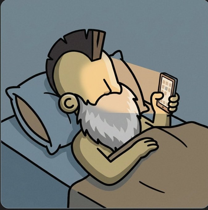 A cartoon illustration of an older man with a white beard lying in bed on a blue pillow, looking at his smartphone.