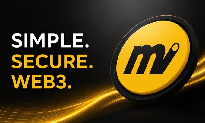 A black banner advertisement displaying the text 'SIMPLE. SECURE. WEB3.' in white and yellow, next to a large gold coin bearing a stylized black 'm' logo.