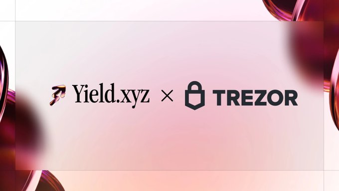 Promotional graphic with 'Yield.xyz × TREZOR' branding on a pink gradient background with glossy red bubble-like accents.