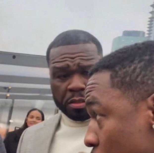 The image shows two men, one in a light-colored suit looking downward with a serious expression, while a woman smiles in the background. It illustrates the post's sentiment of being a misunderstood visionary predicting that $ETH will outperform other major cryptocurrencies this cycle, despite others not seeing the vision.