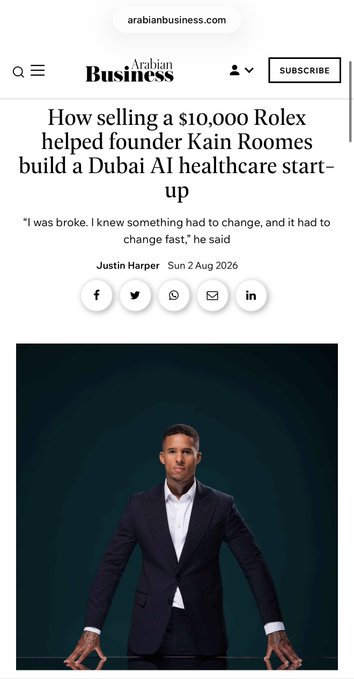 The image shows a screenshot of an Arabian Business article headlined "How selling a $10,000 Rolex helped founder Kain Roomes build a Dubai AI healthcare start-up," featuring a photo of Kain Roomes in a dark suit against a teal background. The article ties to the post by highlighting Roomes' journey as founder and CEO of XRP Healthcare, the first AI healthcare platform built on the XRP Ledger.