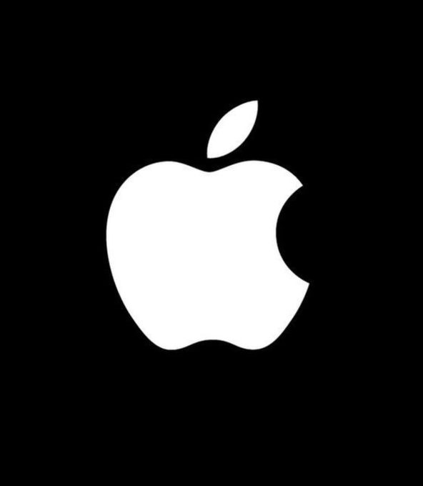 The image displays the iconic white Apple logo on a black background, visually anchoring the news that Apple is expanding its Apple Pay division with roles focused on stablecoin and blockchain strategy amid its 2 billion-user ecosystem.