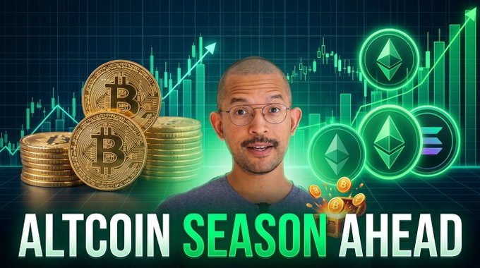 A YouTube thumbnail featuring a glasses-wearing content creator surrounded by gold Bitcoin coins, glowing green Ethereum logos, and Solana emblems against an upward stock chart, with bold text reading "ALTCOIN SEASON AHEAD." The visual ties directly to the post by signaling bullish momentum toward an altcoin rally, with Ethereum highlighted as flashing a buy signal.