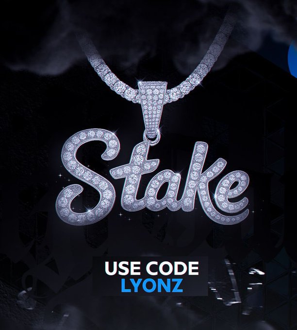 The image showcases an iced-out diamond pendant spelling "Stake" hanging from a tennis chain, set against a dark, smoky background. The promotional graphic includes a discount code "LYONZ," suggesting the poster is announcing their partnership with Stake by sharing a referral code for viewers to use.