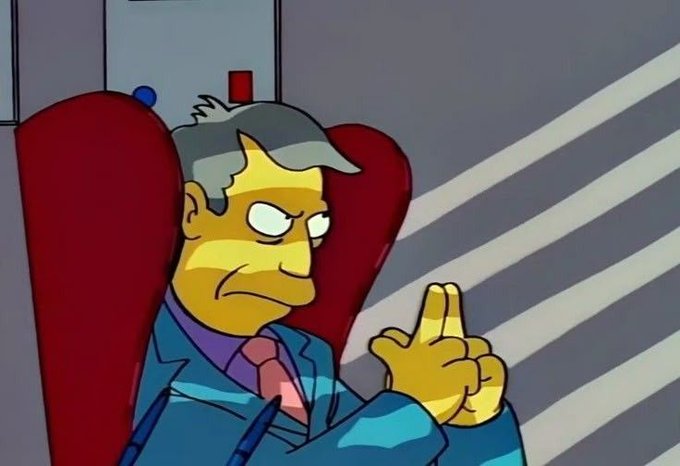 An animated image of Principal Seymour Skinner from The Simpsons sitting in a red chair, making a dismissive two-finger gesture with a serious expression.