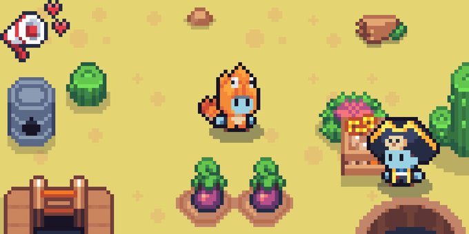 Pixel art showing an orange fish-like character and a blue pirate character on a sandy beach, with cacti, a treasure chest, plants, and a heart icon in the top left corner.