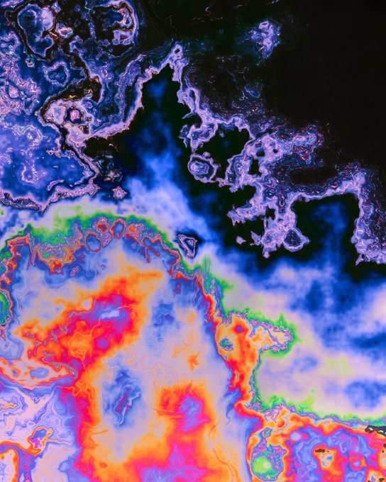 An abstract, colorful fluid art piece features swirling patterns of blue, purple, red, orange, and green with dark borders.