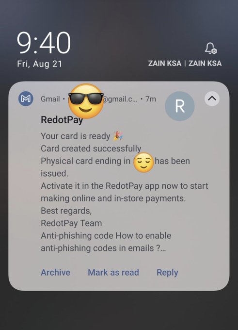 A mobile phone notification from Gmail shows an email from RedotPay stating 'Your card is ready' and 'Card created successfully,' with an emoji of a smiling face with sunglasses, displayed on Friday, August 21 at 9:40.