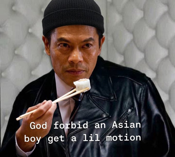 The image shows a man wearing a black beanie and leather jacket holding food with chopsticks, with the caption "God forbid an Asian boy get a lil motion" — humorously commenting on the underdog nature of ZEC holders, who despite facing skepticism about their chosen crypto, remain stoic and unbothered like the focused man enjoying his meal.