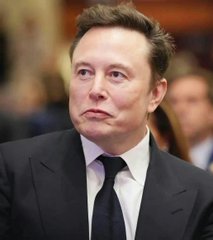 A close-up portrait of Elon Musk wearing a dark suit, white shirt, and dark tie, looking off to the side with a serious expression.