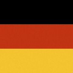 The image displays the German flag, featuring its three horizontal stripes of black, red, and gold. It visually represents Germany in connection with the news about the country's proposed 25% cryptocurrency tax on holdings acquired after December 31, 2026, with automatic tax withholding set to begin in 2028.