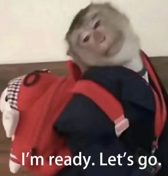 Meme image of a monkey wearing a suit and red backpack with the caption "I'm ready. Let's go."