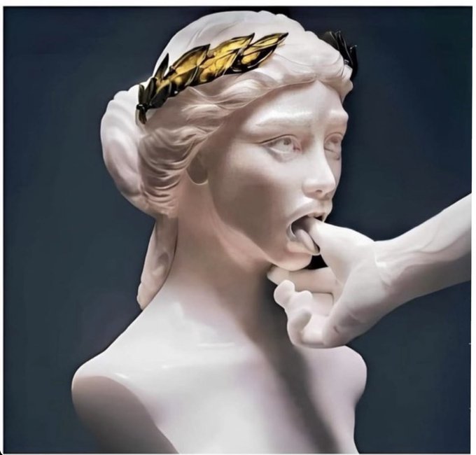 A marble sculpture depicts a woman with a golden laurel wreath having her mouth touched by another hand.