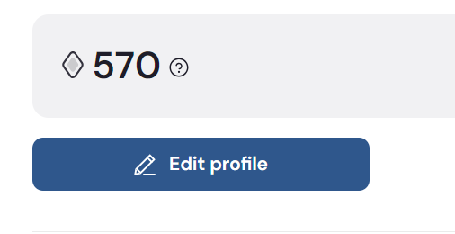 A user profile interface showing a level or score of 570 next to a diamond icon, with a blue 'Edit profile' button below.