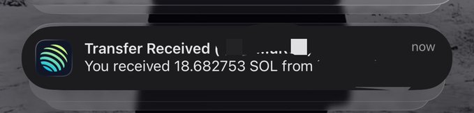 A phone notification displays a "Transfer Received" alert showing 18.682753 SOL being sent to a second wallet, confirming the cross-wallet transaction the post references.
