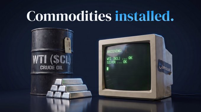 The image promotes a milestone with the headline "Commodities installed." showing a vintage computer monitor displaying a terminal that reads "RECEIVING: WTI ($CL)... OK, SILVER... OK," alongside a barrel of crude oil and silver bars.

The retro computing aesthetic and "installation complete" terminal readout visually reinforce the post's announcement that WTI crude oil and silver are the first traditional finance commodities added to the Breakout platform.