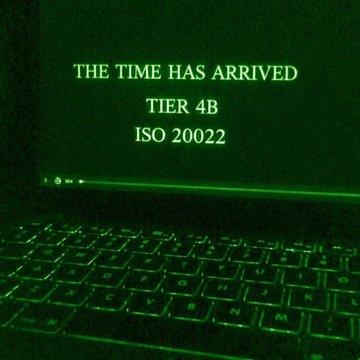 A laptop screen glows green in a dark setting, displaying the text "THE TIME HAS ARRIVED, TIER 4B, ISO 20022," reinforcing the post's urgent "EXECUTION PHASE" messaging about the ISO 20022 financial transition.
