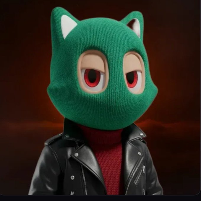 A figure wearing a green knit cat-eared balaclava with red eyes and a black leather jacket stands against a dark background. The image serves as a promotional teaser for the user's upcoming 2000-piece NFT collection drop, with the masked figure likely representing the artistic style or character branding of the project being developed by @BitcoinBruno25 for release next month via @gravemint.