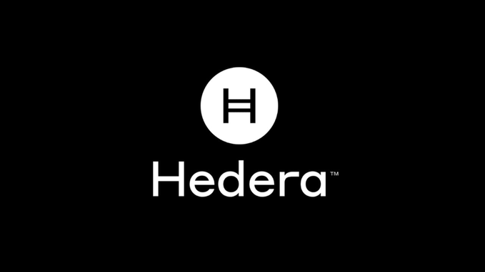The image displays the Hedera logo, featuring a stylized "H" inside a white circle with the word "Hedera" beneath it, set against a black background. This branding ties directly to the post's focus on Hedera as it explores what true enterprise blockchain adoption looks like through the lens of the Hedera network.
