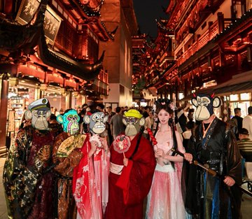A group of people in Bored Ape Yacht Club masks, dressed in traditional Chinese attire, pose in front of the Yu Garden in Shanghai, China, during a themed event. This image visually represents the "apes" mentioned in the post as they experience a "Ming Dynasty" inspired event at Yu Garden, organized by @notburger_ and featuring @BoredApeYC.
