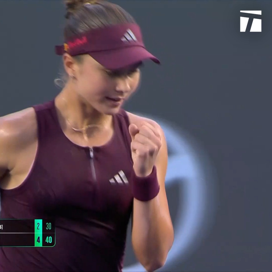 A female tennis player in a maroon Adidas outfit and visor pumps her fist in celebration, with the scoreboard showing 2-30 and 4-40, suggesting she has just won a critical point to advance to the final at the #GDLOpen.
