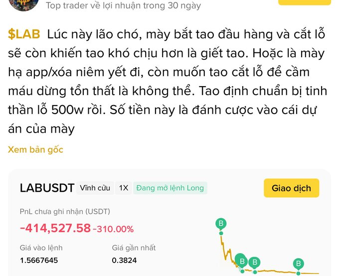A Vietnamese trading post mocking a $LAB token position, showing a PnL of -414,527.58 USDT (-310%) on a LABUSDT long position, with text criticizing the token's creator.