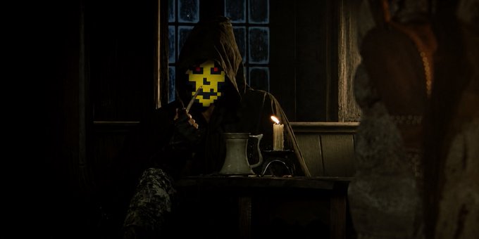 A hooded figure with a pixelated yellow smiley face sits at a candlelit table with a pewter tankard, evoking a mysterious, medieval tavern setting that matches the ominous tone of the post about $DOG and Strider_NFT awaiting a wizard while enemies approach.