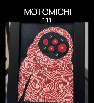 An artwork labeled 'MOTOMICHI 111' featuring a stylized red figure covered in swirling patterns with a black mask displaying multiple red eyes.