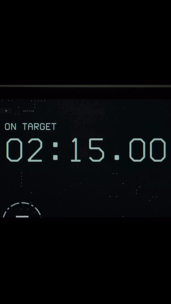A digital timer display reading 'ON TARGET 02:15.00' with a dark, minimalist interface and small UI elements in the background.